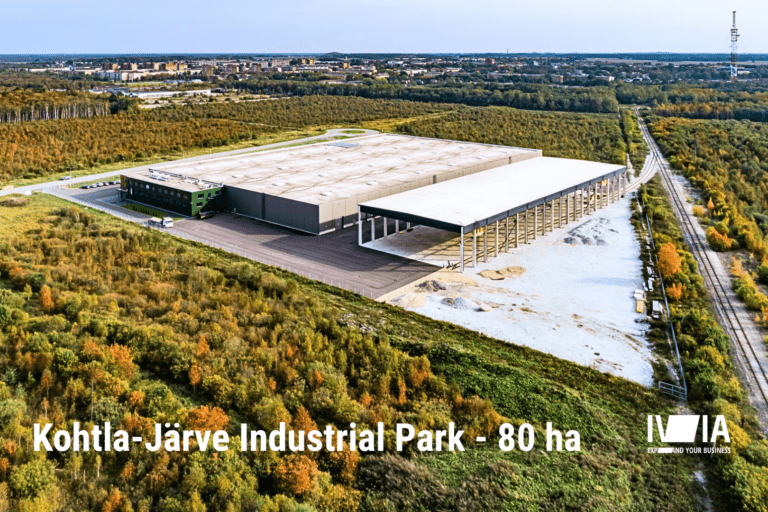 IVIA Kohtla-Järve Industrial Park with Freen OÜ facility in the foreground, a railway line in front, and the town of Kohtla-Järve in the background; photo by Pjotr Aleksandrov.